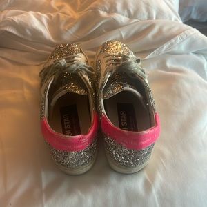 Silver sparkling Golden Goose tennis shoes